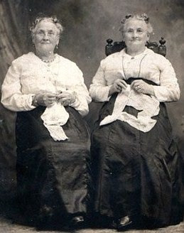 19th century twin sisters doing handwork