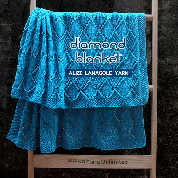 Knitting Unlimited Blanket 25: Diamond Lace Blanket. Size: 34”x40”. Used Alize Lanagold classic yarn.