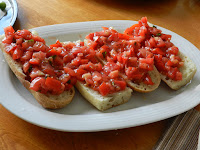 Four Bruschettas on a plate