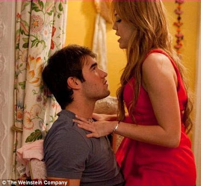 Miley Cyrus strips down to red bra and tiny shorts for her new film So Undercover