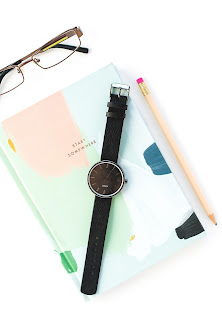wristwatch and journal
