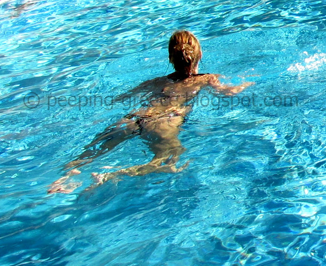 Beautiful brunette woman sexy swimming pool