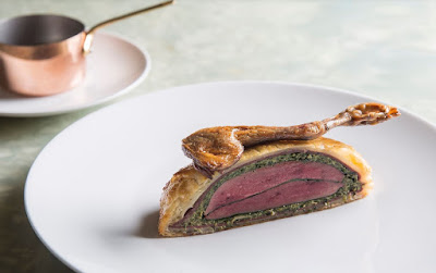 Source: Black Sheep Restaurants. Pigeon pithivier. A pithivier is a tart with an almond filling.