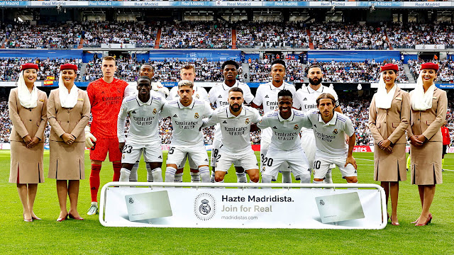 REAL MADRID C. F. Temporada 2022-23. Lunin, Alaba, Kroos, Tchoaméni, Éder Militão, Karim Benzema. Ferland Mendy, Fede Valverde, Carvajal, Vinicius y Luka Modrić. REAL MADRID 3 F. C. BARCELONA 1 Domingo 16/10/2022, 16:15 horas. Campeonato de Liga de 1ª División, jornada 9. Madrid, estadio Santiago Bernabéu: 62.876 espectadores. GOLES: 1-0: 12’, Karim Benzema. 2-0: 35’, Fede Valverde. 2-1: 83’, Ferran Torres. 3-1: 90+1, Rodrygo Goes, de penalti.