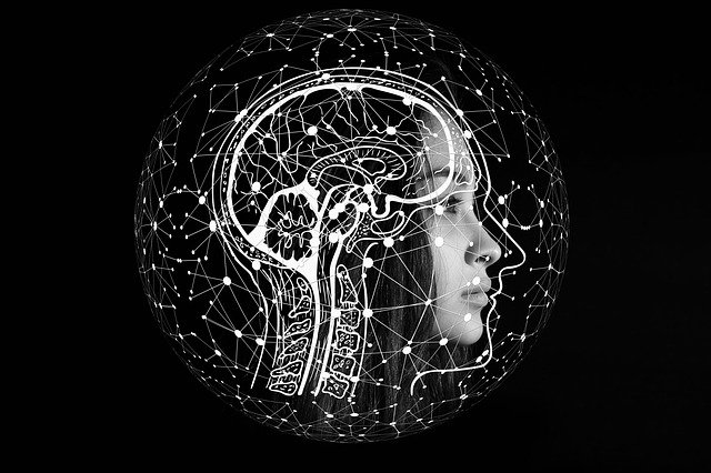 A brain and neural connections superimposed over a woman's head.