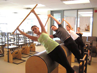 a group doing pilates together