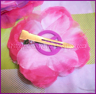 luau flower petals attached to hair clip