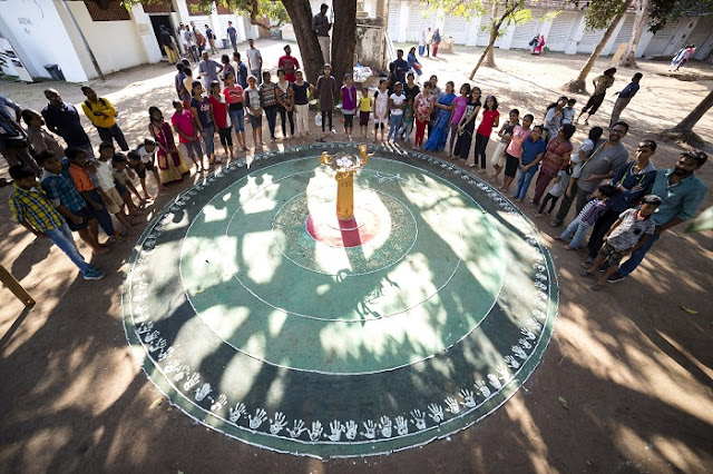 Children drawing  'Kalam' as part of ABC workshop at Aspinwall House,Fort Kochi