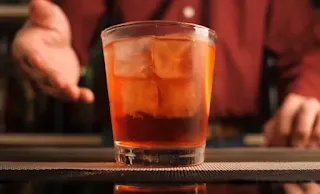 Gin, campari, and red vermouth are combined in equal quantities for the traditional Negroni.