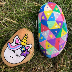 Unicorn and patterned painted rocks