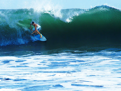 surfer in kuta beach bali