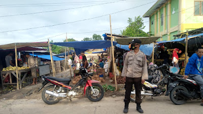 Polsek Pontang Polres Serang Melaksanakan Strong Point Pagi Pengaturan Lalin di Pasar begog Depan Mako Polsek Pontang