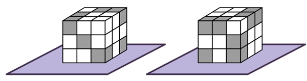 Laura colou 27 cubinhos, alguns brancos e outros cinzentos, formando um cubo maior. A figura mostra duas vistas desse cubo, ambas com a mesma face em contato com a mesa.