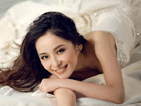 wallpaper for girls, smiley girl picture hd lying on bed