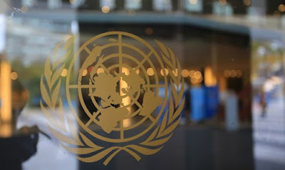 United Nations logo on window