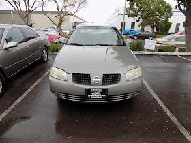 2004 Nissan Sentra after whole car paint at Almost Everything Auto Body.