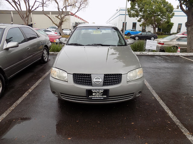 2004 Nissan Sentra after whole car paint at Almost Everything Auto Body.