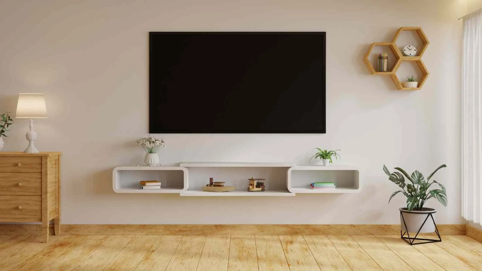 A living room wall with a TV mounted on the wall, image from Canva pro