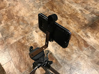 Phone attached to tripod