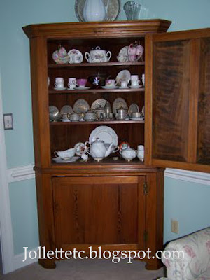 Teacup collection in corner cabinet  https://jollettetc.blogspot.com