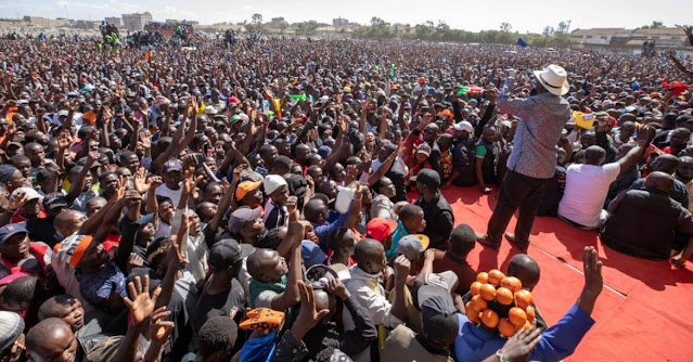 Raila Odinga in a rally in jacaranda