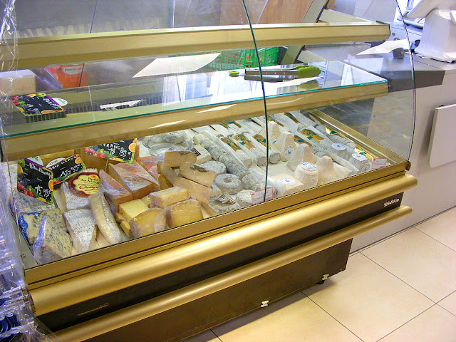 Cheese counter, Village corner shop, Indre et Loire, France. Photo by Loire Valley Time Travel.