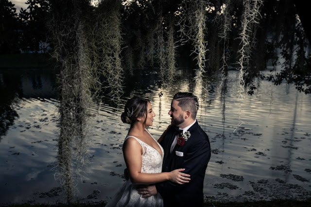 wedding photo in front of water