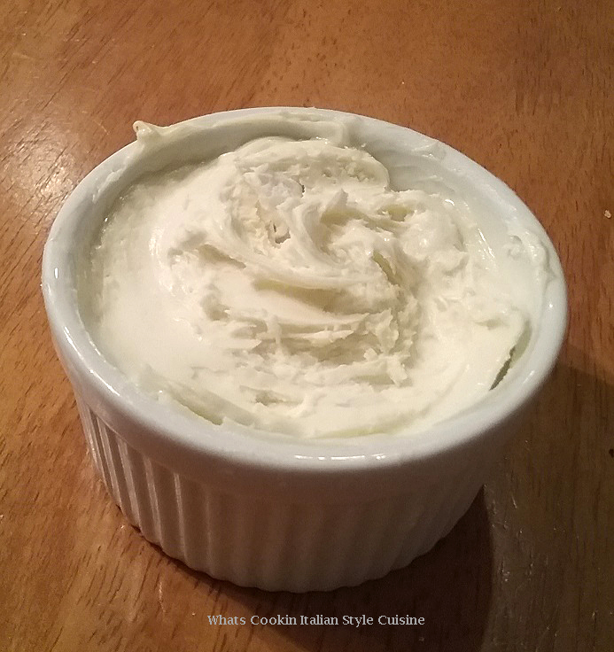 this is a homemade cream cheese frosting for the carrot cake it will go on. It is in a white ceramic dish