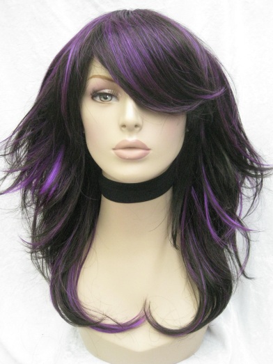 curly hair with purple highlights. hair purple highlights.