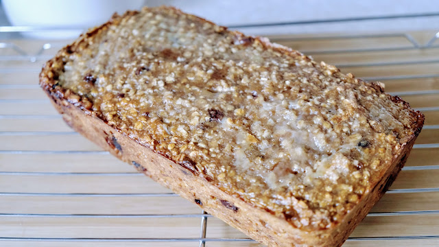 Banana bread with sugar topping on cooling rack