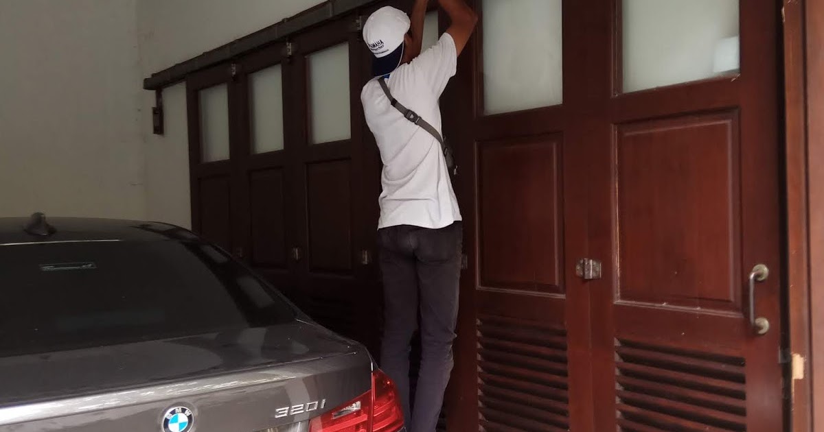 HARIS ROLLING DOOR Bengkel perbaikan pintu  Garasi  geser 