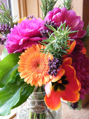 This unique wedding included bouquets and decor that were made up of dahlias