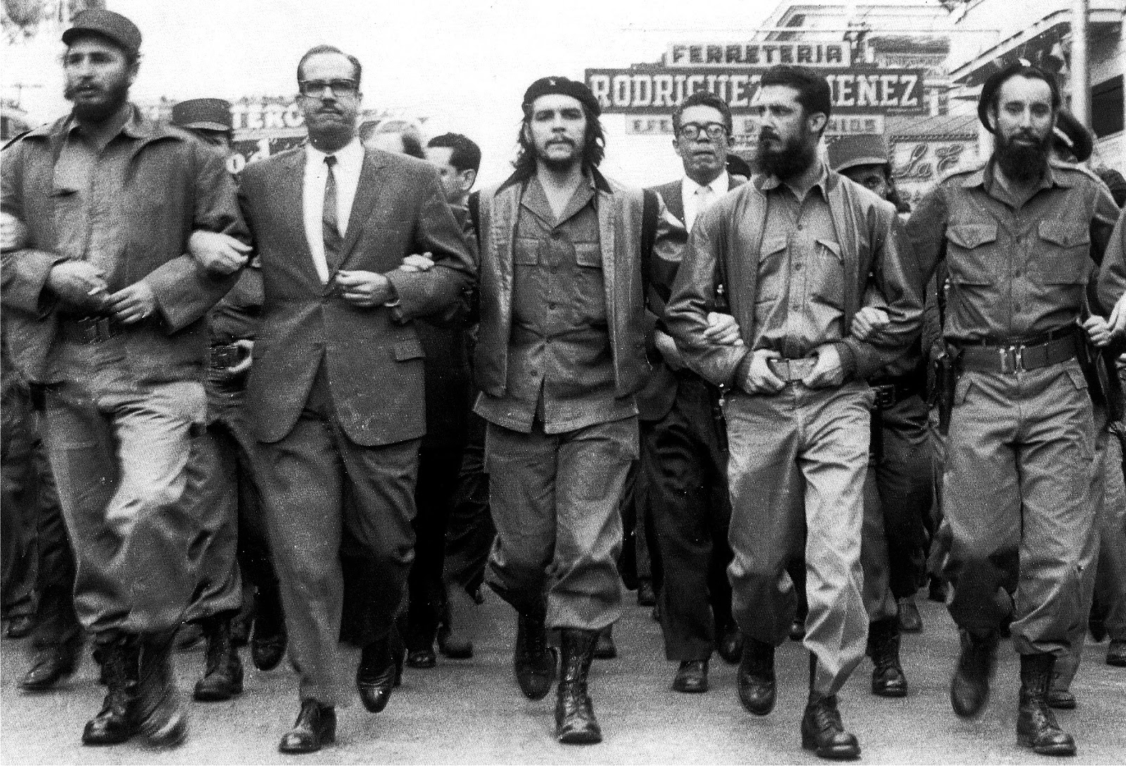 Castro and Guevara Marching