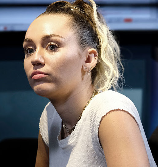 Obsessed Miley Cyrus fan arrested after making creepy posts about the singer then traveled cross-country to see her in person