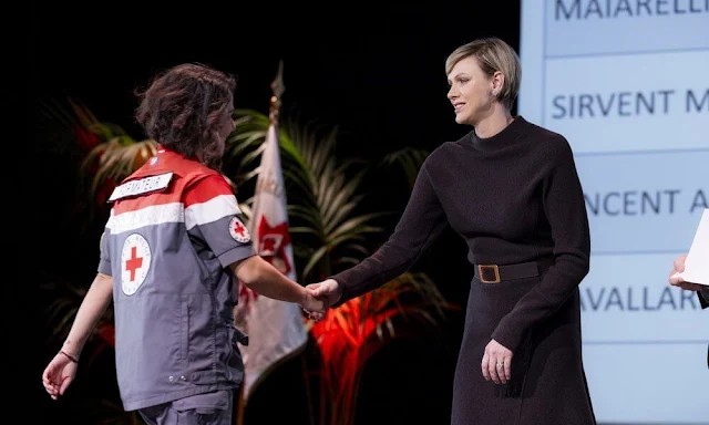 Vice-President of the Monaco Red Cross Princess Charlene wore a black knit wool midi dress by Akris