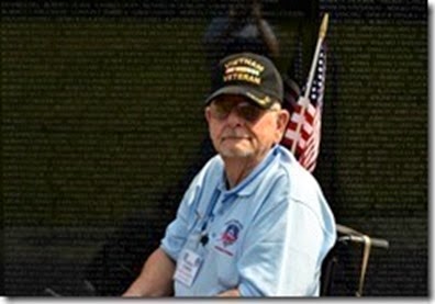 Wayne-in-Front-of-Vietnam-Wall_thumb[1]