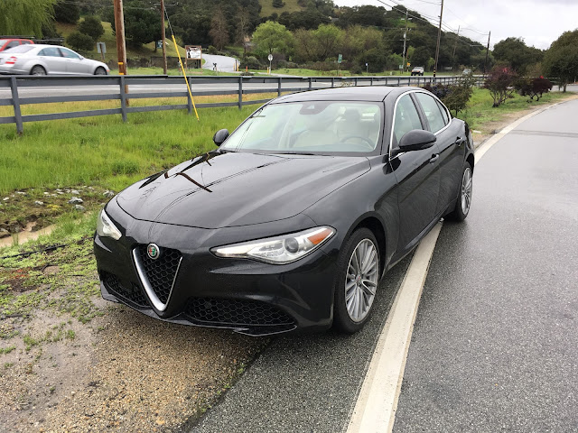 Front 3/4 view of 2018 Alfa Romeo Guilia Ti Lusso Q4