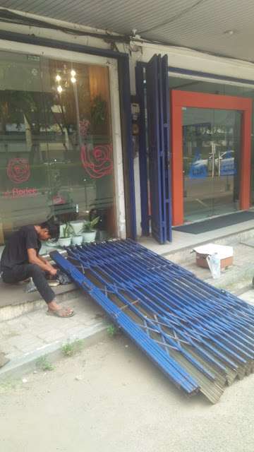 Jasa service rolling door folding gate murah