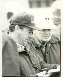 Coaches Jack Pyrah and Jack Heath score a Gloucester Catholic Cross Country Meet