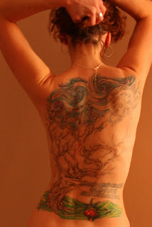 Tattooed Lady with Full Back Tattoo Design