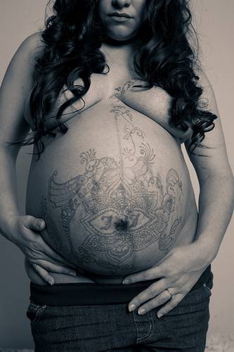 Pregnancy Tattoos Design. During a pregnancy, the net-like pattern of the 