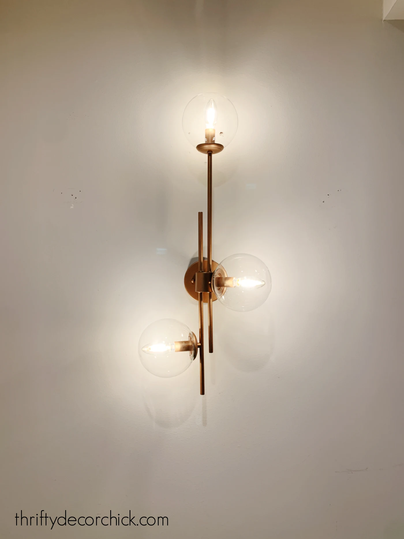 Lowe's Ellan three globe light sconce