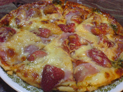 Ham, cheese and strawberry pizza