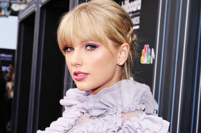 "Scott Borchetta never gave Taylor Swift an opportunity to purchase her masters, or the label, outright with a check in the way he is now apparently doing for others," says Don Passman. Taylor Swift 's attorney, Don Passman , has now stepped into the battle between the superstar singer, Big Machine Label Group's founder/CEO Scott Borchetta and Scooter Braun , whose Ithaca Holdings purchased BMLG (including Swift's master recordings) June 30 for more than $300 million. In a statement on Tuesday (July 2), Passman said, "Scott Borchetta never gave Taylor Swift an opportunity to purchase her masters, or the label, outright with a check in the way he is now apparently doing for others." After the purchase was announced, Swift quickly took to Tumblr to call Braun's purchase her "worst case scenario," saying she has suffered "incessant, manipulative bullying...at his hands." She added, "For years I asked, pleaded for a chance to own my work. Instead I was given an opportunity to sign back up to Big Machine Records and 'earn' one album back at a time, one for every new one I turned in." A few hours later, Borchetta dismissed Swift's assertion in a post titled "So, It's Time For Some Truth." Borchetta claimed "100% of all Taylor Swift assets were to be transferred to her immediately upon signing the new agreement. We were working together on a new type of deal for our new streaming world that was not necessarily tied to 'albums' but more of a length of time... Taylor had every chance in the world to own not just her master recordings, but every video, photograph, everything associated to her career. She chose to leave." In a response to a proposal between Swift's management team and Passman named "TS Proposal" and dated Aug. 15, 2018, BMLG agreed that "Upon execution [of a new contract], "BMLG shall assign to TS all recordings (audio and/or visual), artwork, photographs and any other materials relating to TS which BMLG owns or controls." The two parties could never come to terms and in November, Swift left BMLG for a global deal with Universal Music Group. However, the masters for her first six albums remain with BMLG and are now owned by Ithaca Holdings. Today's move is a highly unusual one for Passman, who almost never comments on artists' deals and declined to comment beyond the statement to Billboard. Unclear is where Borchetta ever inferred that Swift could buy back her masters or the label and if the "others" mentioned in the statement is Braun-- or other artists. Since the sale was announced, acts have lined up for Team Swift or Team Braun, creating the most public battle about an artists' masters in recent memory. Big Machine Label Group declined to comment. Swift's representative could not be immediately reached. SHARE THIS:       BUSINESS Taylor Swift's Attorney Says Singer Never Had a Chance to 'Outright' Buy Back Her Masters From Big Machine, sunshevy.blogspot.com