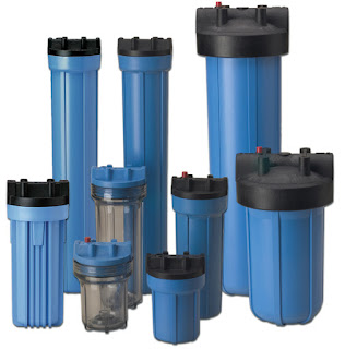 Water filter housings and filter cartridges