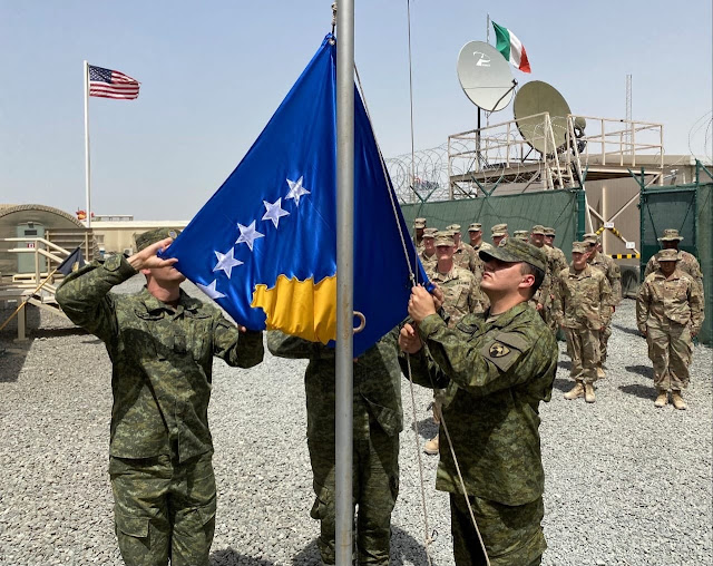 Kosovo flag raised at the peace mission camp in Kuwait