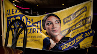 Alexandria Ocasio-Cortez campaign poster (Credit: Scott Heins / Getty Images) Click to Enlarge.