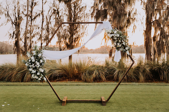 ceremony hexagon arch with flowers