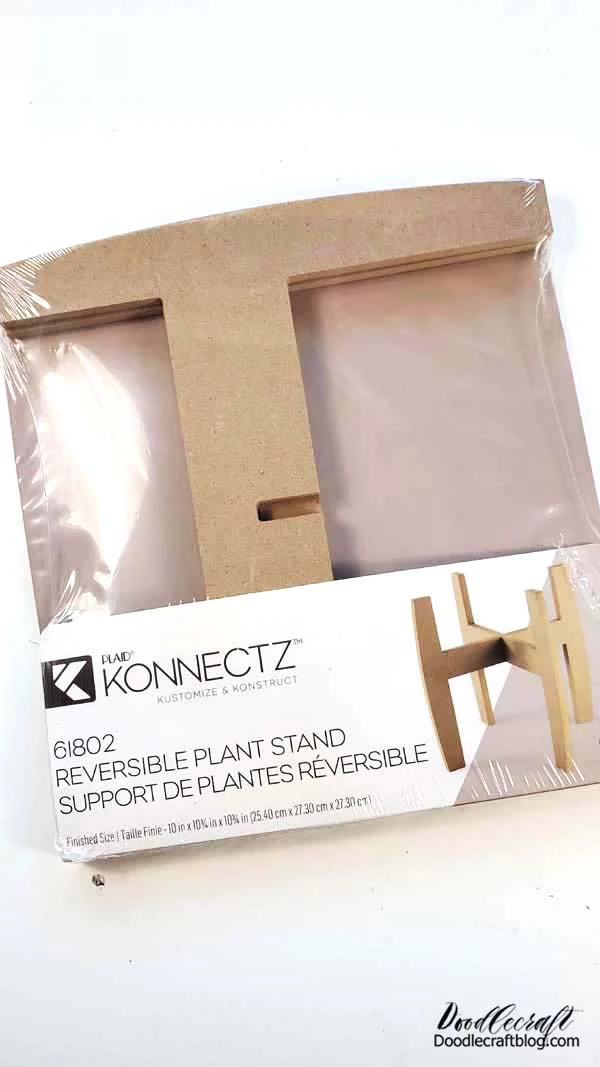 Step 1: Konnectz Plant Stand  Open up the plant stand and you'll find nearly 2 identical pieces of mdf wood.   Except the cutout in the center is different.   This way you can easily slide the top piece into the bottom piece.
