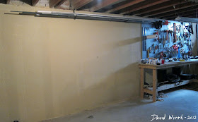 how to hang a wall peg board, work area for pegboard